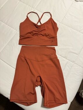 Gymshark Rust Orange Workout Bra and Bike Shorts Set Size Medium